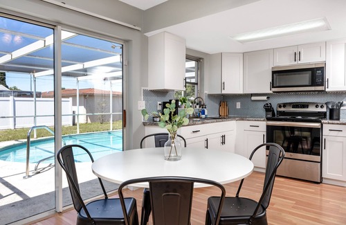 Jasmine Estates House | Sunny Escape: Vibrant Pool Home