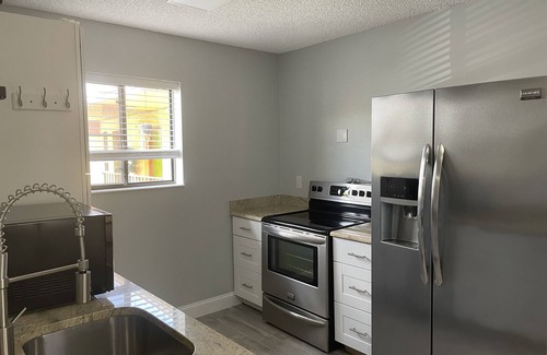 South Palm Park Neighborhood Association Hotel | Sunny Palms Inn