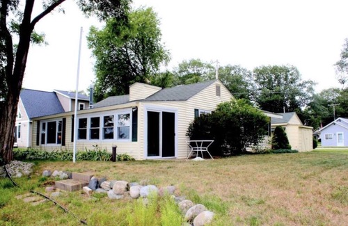 Gaylord Cottage | Sunshine Cottage on 100’ of sandy Otsego Lake. Gaylord, Mi. Boat, golf, relax