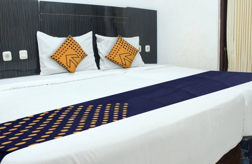 Marusu Hotel | Super OYO 2704 Hotel Transit 2