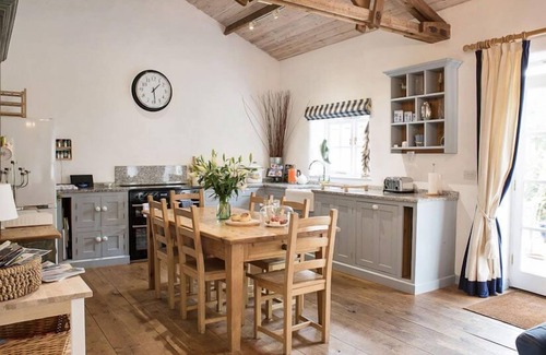 Ottery St Mary House | Superb detached Grade II listed barn conversion with private hot tub, close to coast