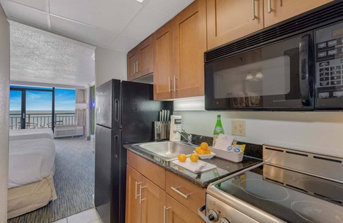 Downtown Myrtle Beach Condo | Surf Pavilion by StayMareni - Neon 2 Queen Beds Suite