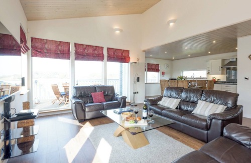 Hopton Cottage | Swedish timber-style house, with sauna and hot tub, on a 400-acre estate.