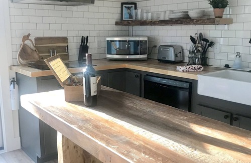 Woodfin Cottage | Sweet & cozy cottage with a mix of modern & vintage style awaits you!