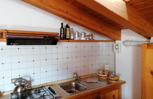 Songavazzo House | Sweet Home Casa Vacanze "La Mansarda"