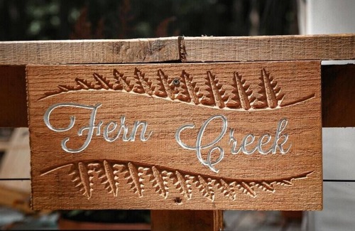 Carrolltowne RV Rental | Tentrr Signature Site - Fern Creek at Azimuth Acres - Coleman Cooking Site