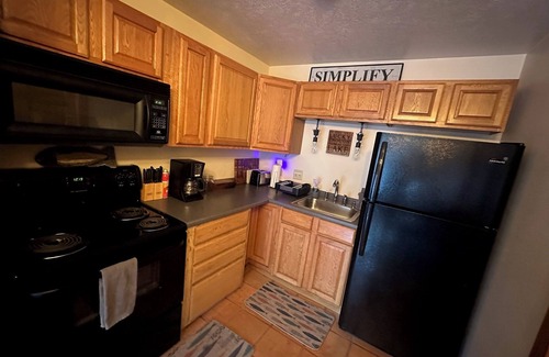 Sylvan Shores Cabin | Terrace - lakefront, hot tub, full kitchen, BBQ, screened in porch, two patios.