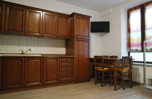 Santa Maria Maddalena Apartment | Terraces two-room studios with patio and parking in front