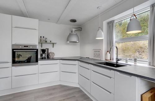 Toftum House | Thatched cottage with modern, bright interior and underfloor heating throughout the first floor.