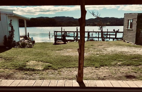 Strahan Bed & Breakfast | The Artists Cottage - absolute waterfront