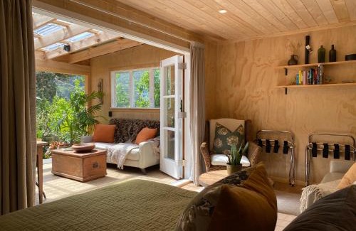 Tryphena House | The Bay Cottage - Located Directly Across the Road from 2 Swimming Beaches