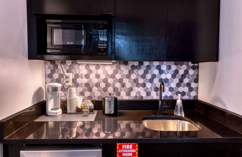 Biloxi Hotel | The Bella's Purple Prince Suite, Sleeps 2, Private Balcony