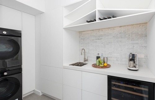 Bonnells Bay Apartment | The Boathouse- Unwind at this tranquil, absolute waterfront, luxury Boathouse nestled on the edge of