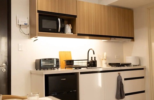 Silang Junction South Condo | The Cabin Ayala Serin by John Morales