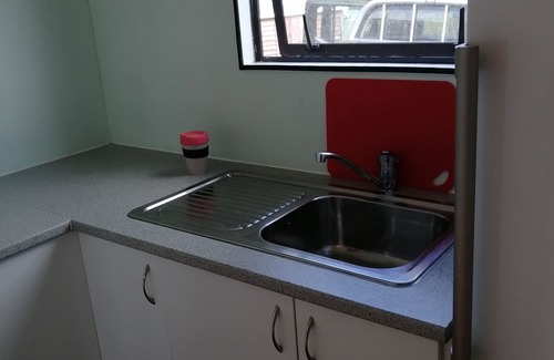 Te Arai Apartment | The cabins with 50 acres of private bush