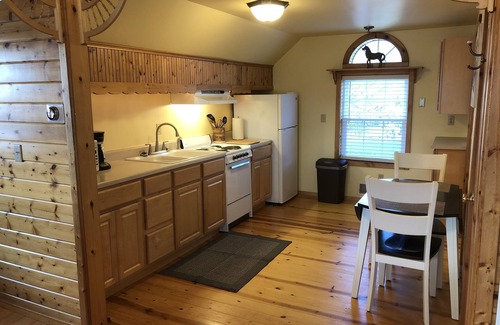 Mackinaw City Apartment | “The Carriage Haus Studio” downtown Mackinaw City!