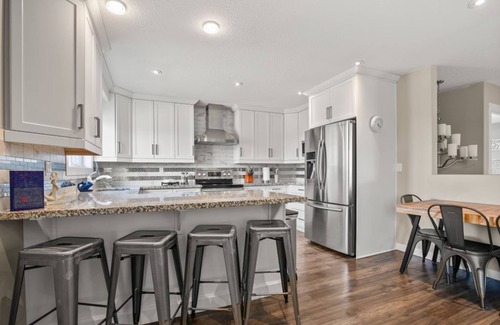 Sylvan Lake House | The Carriage House in Sylvan Lake~Private Patio~Sleeps 4 Adults/2 Children
