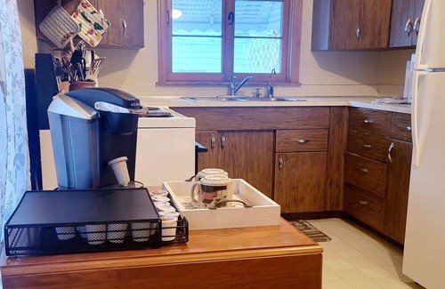 Terry House | The Cozy Cottage is nestled in a charming neighborhood for the perfect get-away.