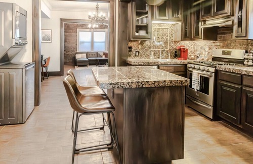 Maple Ridge Apartment | The Dark Heart - Sleek, 1920's Brick Enclosed Apt.