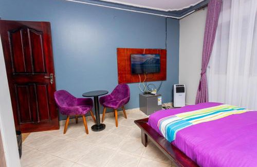 Soroti Apartment | The Den Soroti Purple