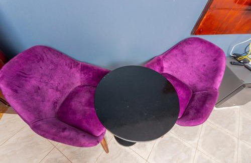 Soroti Apartment | The Den Soroti Purple