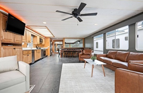 Allons Boat Rental | The Flagship Houseboat 84' - Largest Houseboat, 6 bedrooms,waterslide, fireplace on rooftop lounge area