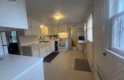 Pipes Cove Cottage | 'The Gate House'on Beach front Estate with Dockage. Walk to Village .