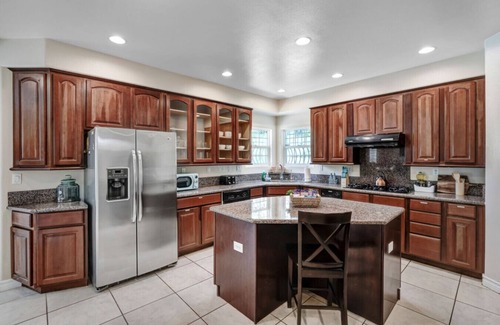 Covina House | The Hillside Sanctuary Pool: 6 bedrooms, with fitness area, and wide backyard