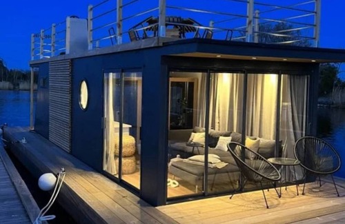 Solvesborg Boat Rental | The houseboat Astrid