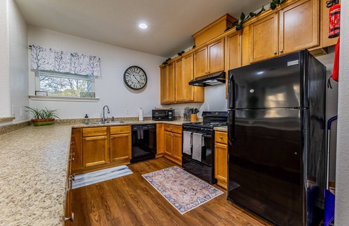 Northside House | The Little Blue Home on Lonnie Lane Near Downtown and Major Hotspots