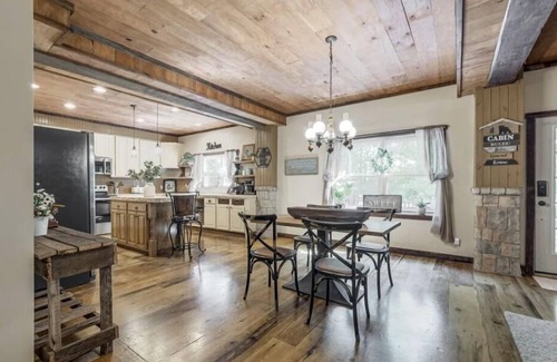 Cottontown Cabin | The Log Palace Private Guest Suite by RedAwning