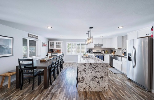 Edgewater House | The Mile High Haven: An Entertainers Dream with Hot Tub + Perfect Location