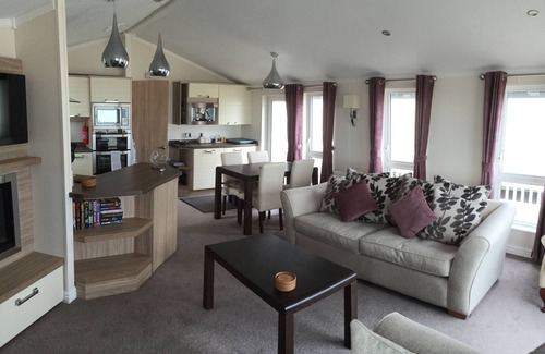 Mudeford Ski Chalet | 'The Shed', A luxury lodge with a view, Sandhills Holiday Park Mudeford