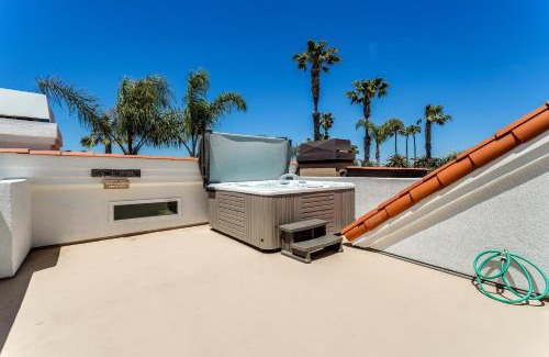 Huntington Beach House | The White House with spa, bikes and steps to the beach and down town main street shops and dining