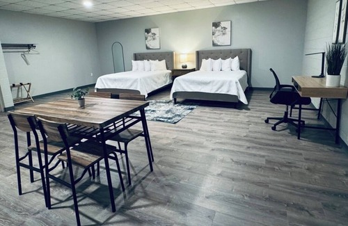 Wellston Hotel | The Woods Suite #301 Free Arcade, Movie Theater, Patio Area, Playground and more