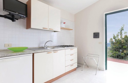 Monte Chiaro Apartment | These bungalows are located in a vacation home complex directly above the sea, with panoramic views