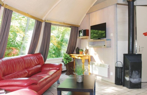 Municipality of Alphen-Chaam House | These detached bungalows with domed roofs are scattered in a wooded resort.