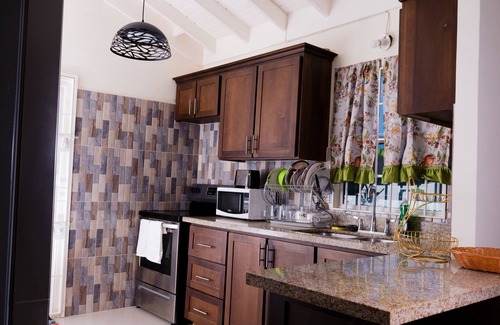 Falmouth House | This cozy home is ten minutes from the turquois waters of the Caribbean sea.