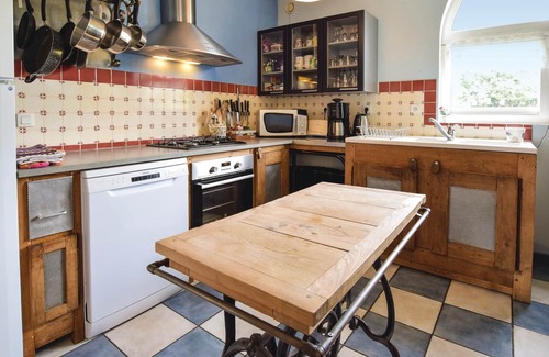 Ancourteville-sur-Hericourt House | This large cottage has an open fireplace.