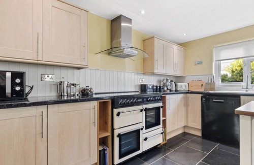 Haverfordwest Cottage | This spacious family home with glorious wood burner has all year round charm.