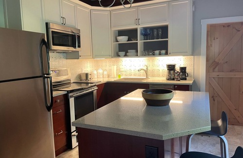 Loveland House | This spacious family getaway is very private on one acre of land.