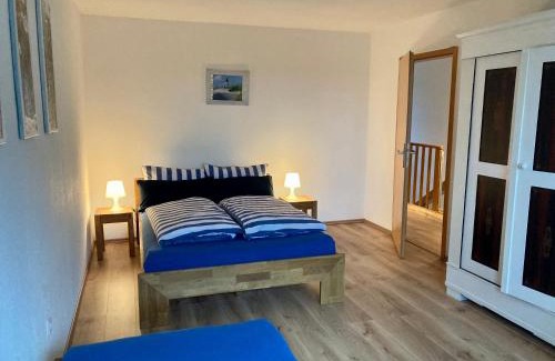 Tarp House | Thomsen - familienfreundliche Ferienwohnung mit großem Garten