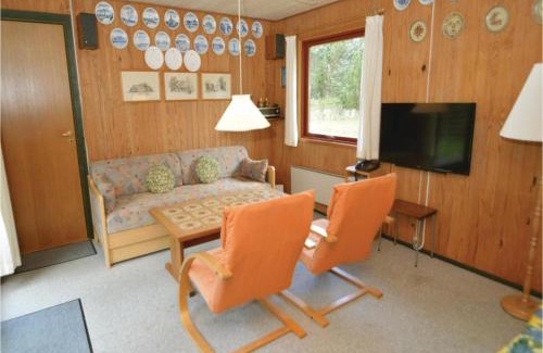 Blavand House | Three-Bedroom Holiday Home Blåvand With A Fireplace 05