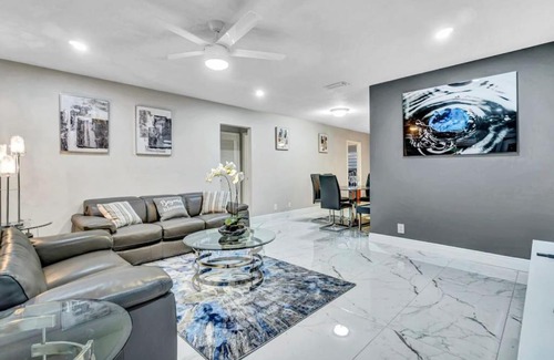 Coral Springs House | Three Bedroom Pool Home with Modern Interior Design