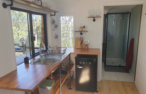 Bollier Cabin | Tiny in The Treesn- Cute, Spacious Tiny House set privately amongst the trees.n