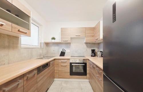 Heiligenhaus Apartment | Tolstov Apartments - Monteurwohnung - 2 Schlafzimmer - Wohnzimmer - Küche - Balkon - Waschmaschine - 25 Min zur Messe DUS