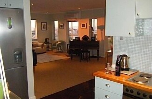 Sea Point Apartment | Top Corner Apartment With Views To Robben Island and a corner of Table Mountain