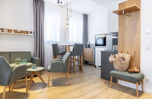 Wismar Apartment | Topmodernes Eck-apartment mit Hafenblick und Fußbodenheizung im Hafen von Wismar