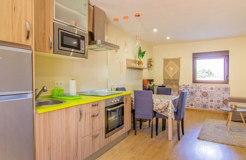 Vilamea House | Traditional stone house with cozy interior.