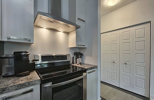 Tetreaultville Condo | Tranquil Haven: Fully-Furnished 3½ Condo with All-Inclusive Comforts